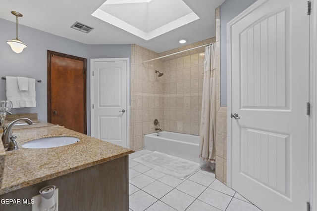 608 Paseo De Luna Ln, El Paso, TX 79912 - bathroom with a skylight, tile patterned flooring, shower / tub combo, and double vanity
