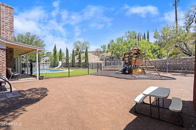 608 Paseo De Luna Ln, El Paso, TX 79912 - community jungle gym featuring a patio area