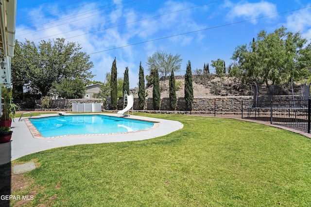 608 Paseo De Luna Ln, El Paso, TX 79912 - view of pool with a water slide, a fenced backyard, and a diving board