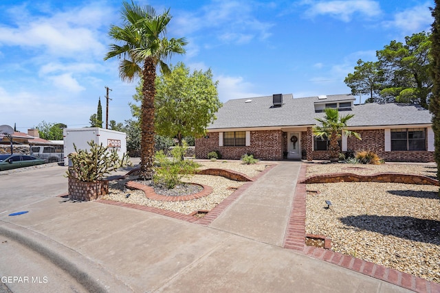 608 Paseo De Luna Ln, El Paso, TX 79912 - view of front of house with roof with shingles and brick siding