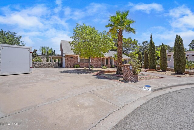 608 Paseo De Luna Ln, El Paso, TX 79912 - view of front of property featuring brick siding and driveway