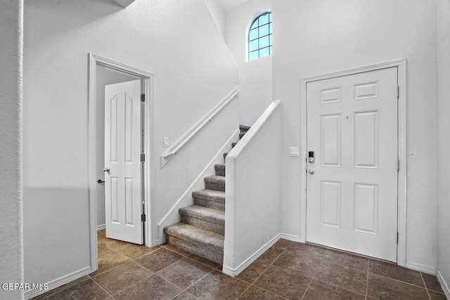 5020 Copper Ranch Ave, El Paso, TX 79934 - foyer entrance featuring stairway and baseboards
