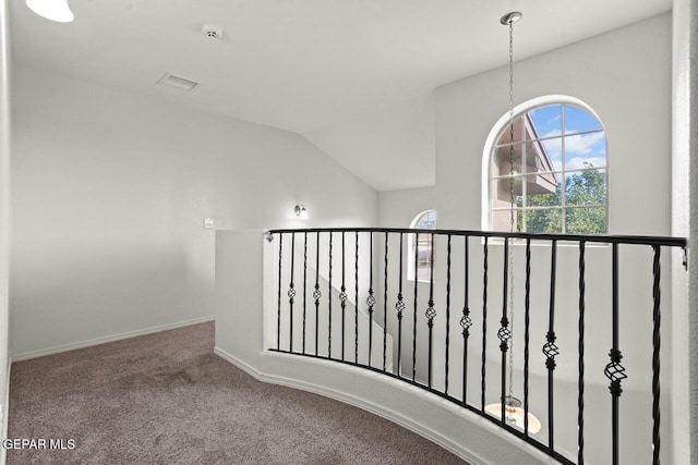 5020 Copper Ranch Ave, El Paso, TX 79934 - corridor with carpet floors and vaulted ceiling