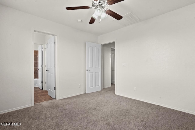 5020 Copper Ranch Ave, El Paso, TX 79934 - unfurnished bedroom with carpet, connected bathroom, and a ceiling fan