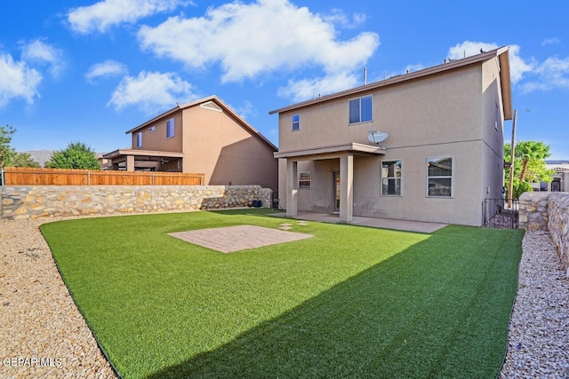 5020 Copper Ranch Ave, El Paso, TX 79934 - rear view of house featuring stucco siding and a patio