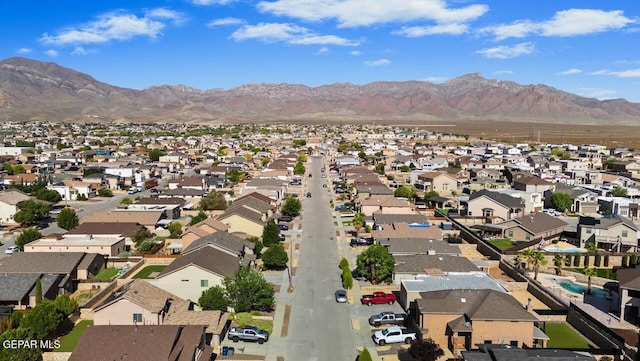5020 Copper Ranch Ave, El Paso, TX 79934 - aerial view of property and surrounding area with nearby suburban area and a mountain backdrop