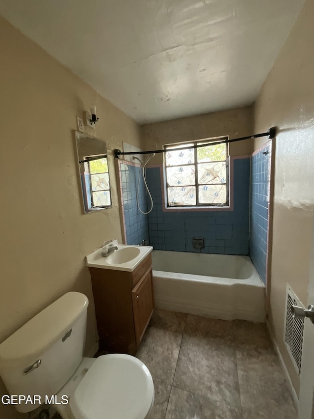 320 Edith Dr, El Paso, TX 79915 - bathroom with bathtub / shower combination and vanity