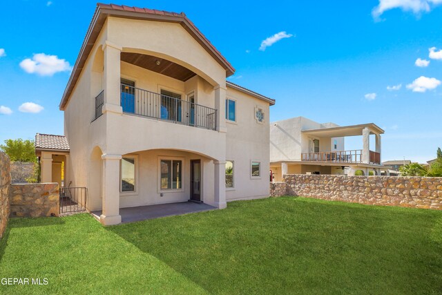 545 Lanner Dr, El Paso, TX 79928 - rear view of property with a balcony, stucco siding, a patio area, and a tiled roof