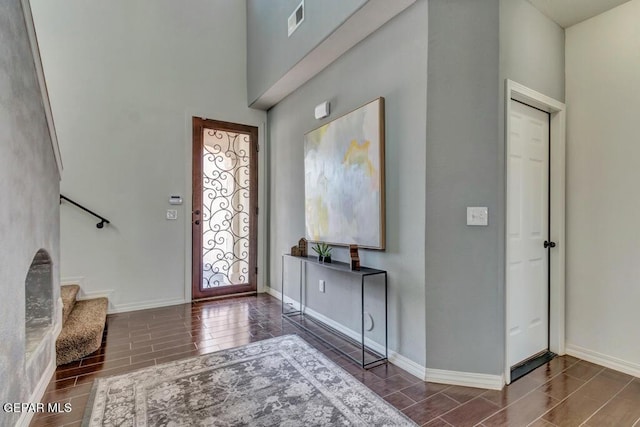 545 Lanner Dr, El Paso, TX 79928 - foyer entrance with wood tiled floors and stairs