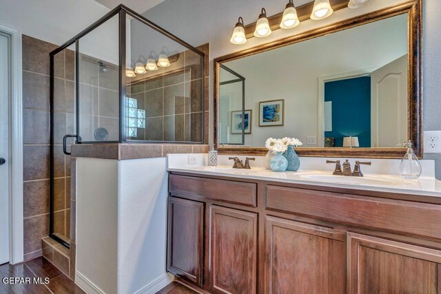 545 Lanner Dr, El Paso, TX 79928 - full bath with a stall shower and double vanity