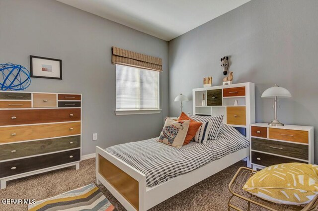545 Lanner Dr, El Paso, TX 79928 - bedroom featuring carpet flooring and baseboards