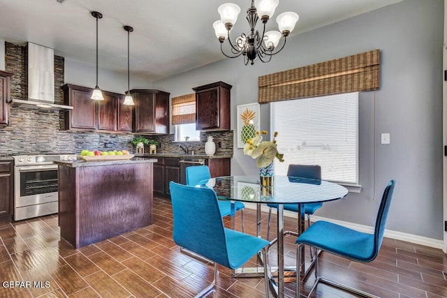 545 Lanner Dr, El Paso, TX 79928 - dining area featuring a chandelier and wood finish floors