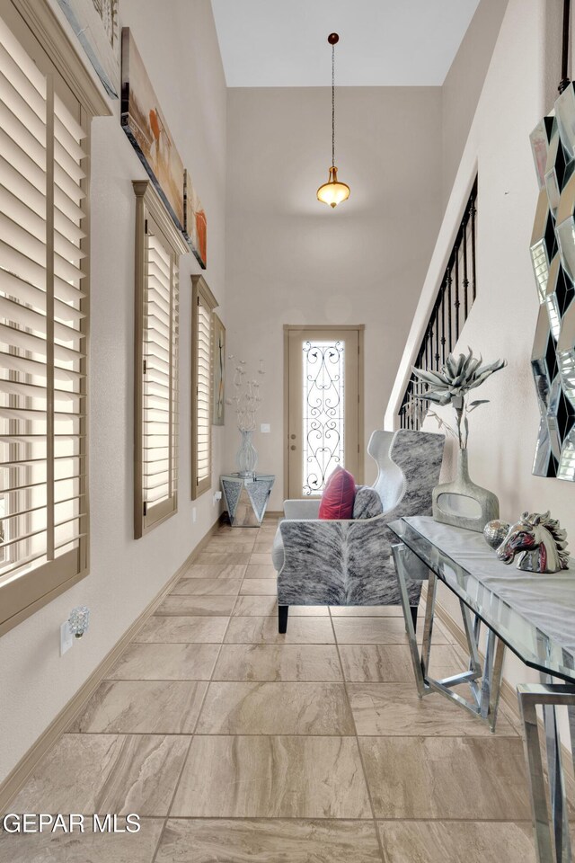 14192 Earl Chokiski, El Paso, TX 79938 - foyer entrance with a high ceiling and baseboards