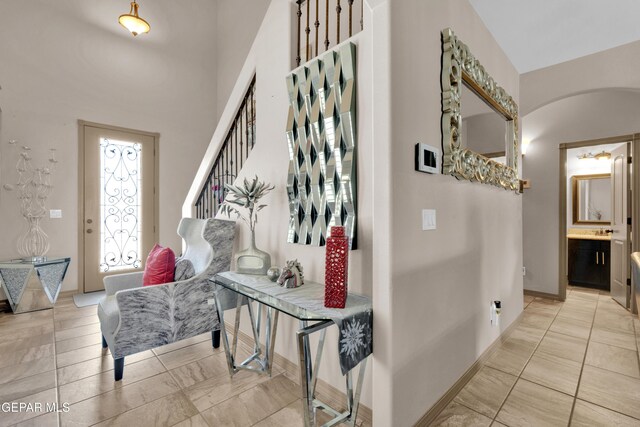 14192 Earl Chokiski, El Paso, TX 79938 - hall with arched walkways and a high ceiling