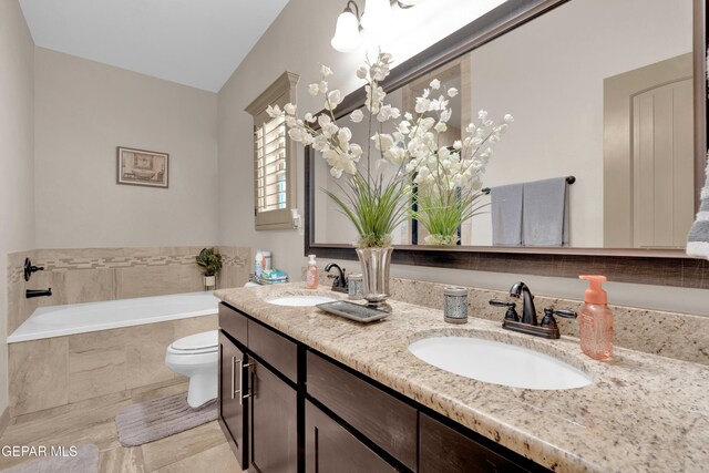 14192 Earl Chokiski, El Paso, TX 79938 - full bath featuring double vanity and a bath