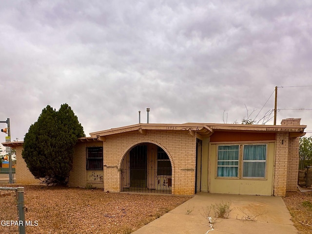 10466 Triumph Dr, El Paso, TX 79924 - view of front of home featuring brick siding