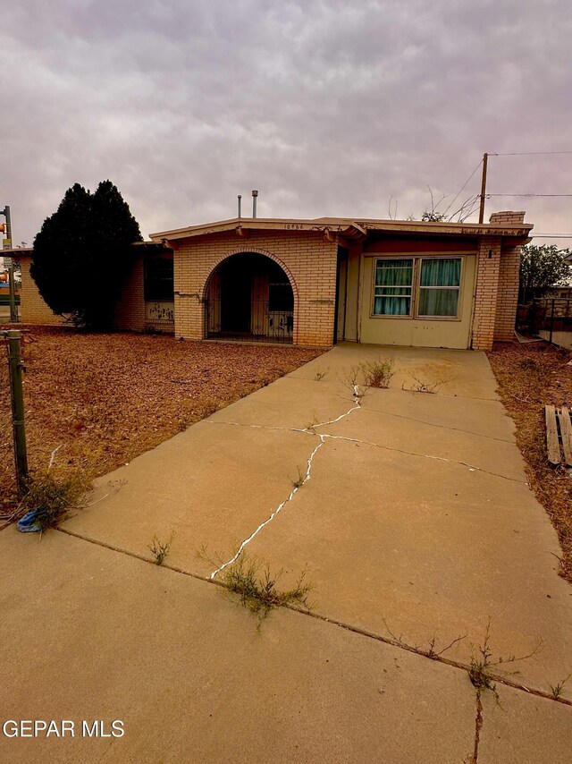 10466 Triumph Dr, El Paso, TX 79924 - ranch-style house featuring brick siding and driveway