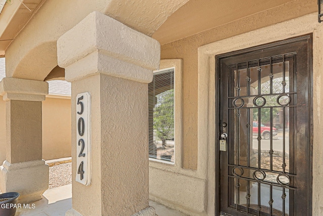 5024 Gold Ranch Ave, El Paso, TX 79934 - property entrance with stucco siding