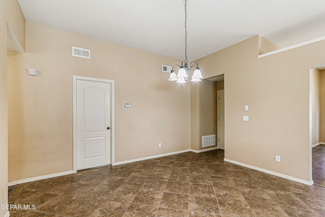 5024 Gold Ranch Ave, El Paso, TX 79934 - unfurnished room with stone finish floors and a chandelier