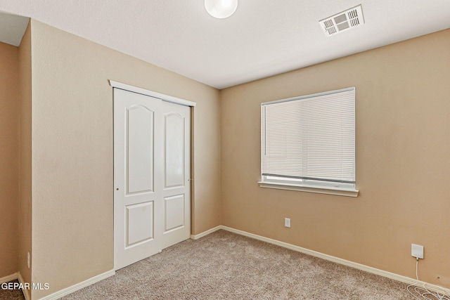 5024 Gold Ranch Ave, El Paso, TX 79934 - unfurnished bedroom featuring carpet and baseboards