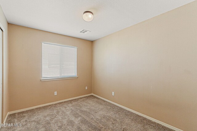 5024 Gold Ranch Ave, El Paso, TX 79934 - unfurnished room featuring carpet floors and baseboards
