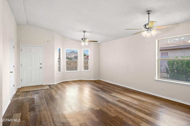 10980 Northampton St, El Paso, TX 79934 - foyer featuring a ceiling fan, wood finished floors, a textured ceiling, and vaulted ceiling
