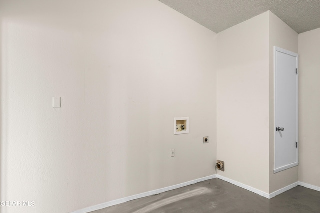 10980 Northampton St, El Paso, TX 79934 - laundry area with hookup for an electric dryer, washer hookup, and a textured ceiling