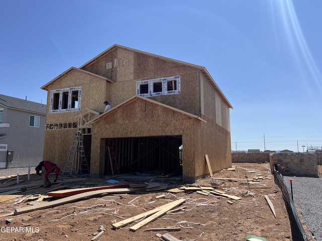 3720 Hill Top Place, El Paso, TX 79938 - rear view of property featuring stucco siding, a garage, and an outbuilding