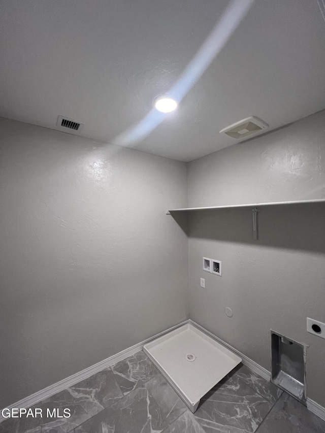 3720 Hill Top Place, El Paso, TX 79938 - washroom featuring hookup for a gas dryer, marble look tiles, hookup for a washing machine, and hookup for an electric dryer