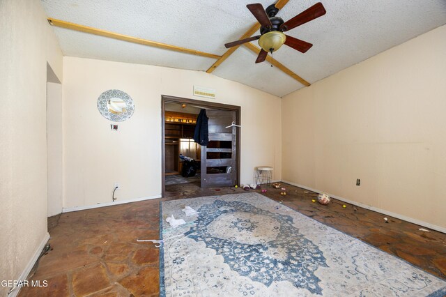 123 Marquita Ln, El Paso, TX 79915 - empty room with a ceiling fan, lofted ceiling, and a textured ceiling