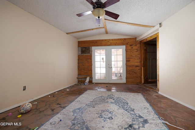 123 Marquita Ln, El Paso, TX 79915 - spare room with french doors, vaulted ceiling, ceiling fan, and a textured ceiling