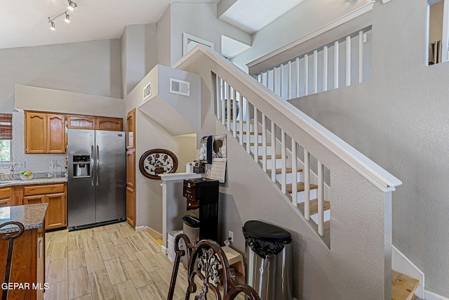 700 Milton Henry Ave, El Paso, TX 79932 - stairs with wood finished floors and baseboards