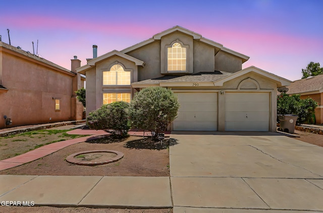 700 Milton Henry Ave, El Paso, TX 79932 - traditional-style house featuring stucco siding and concrete driveway