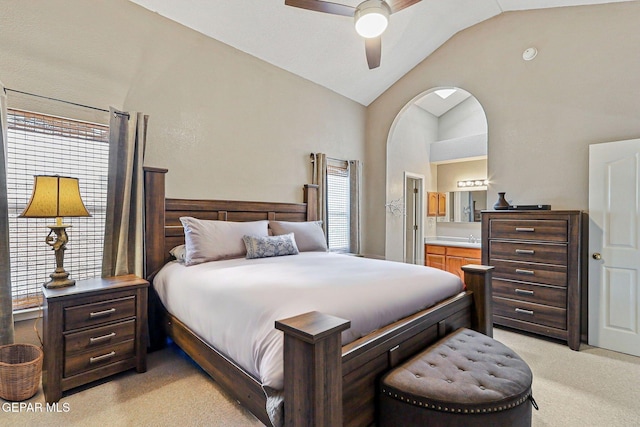 700 Milton Henry Ave, El Paso, TX 79932 - bedroom featuring light colored carpet, ensuite bathroom, high vaulted ceiling, and a ceiling fan