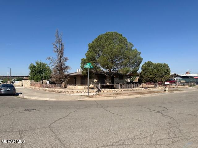 7190 Fatima Ave, El Paso, TX 79915 - view of property hidden behind natural elements