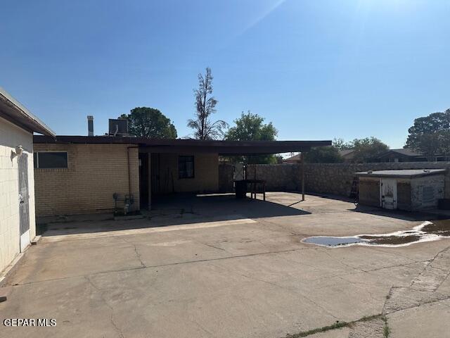 7190 Fatima Ave, El Paso, TX 79915 - rear view of property with brick siding
