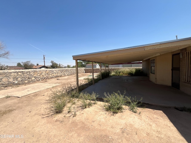 8725 Clavel Dr, El Paso, TX 79907 - view of patio / terrace featuring an attached carport