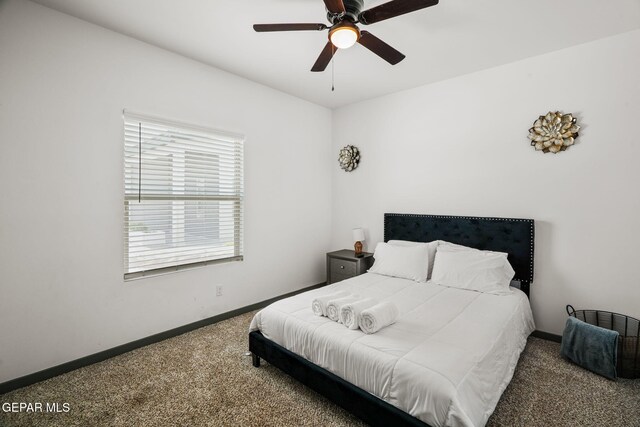 13699 Kathys Ct, El Paso, TX 79928 - carpeted bedroom featuring baseboards and ceiling fan