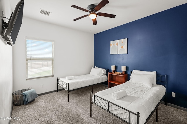 13699 Kathys Ct, El Paso, TX 79928 - carpeted bedroom with baseboards and ceiling fan