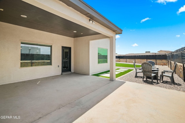 13699 Kathys Ct, El Paso, TX 79928 - fenced backyard with a patio area