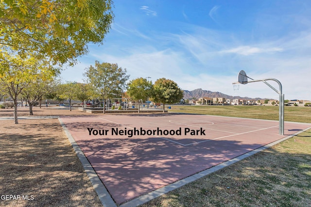 5465 Limestone Dr, El Paso, TX 79934 - view of basketball court featuring a yard, community basketball court, and a mountain view
