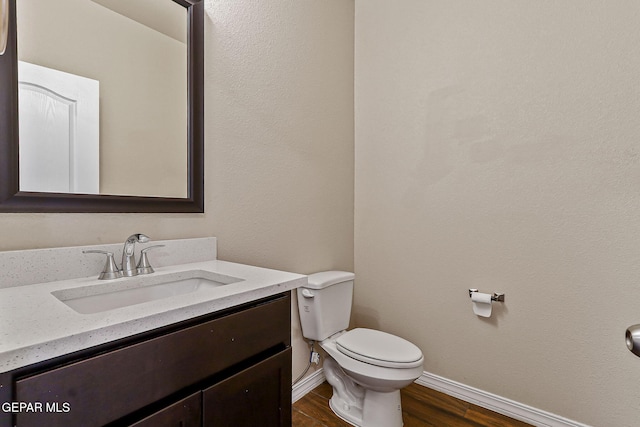 5465 Limestone Dr, El Paso, TX 79934 - half bathroom featuring wood finished floors and vanity