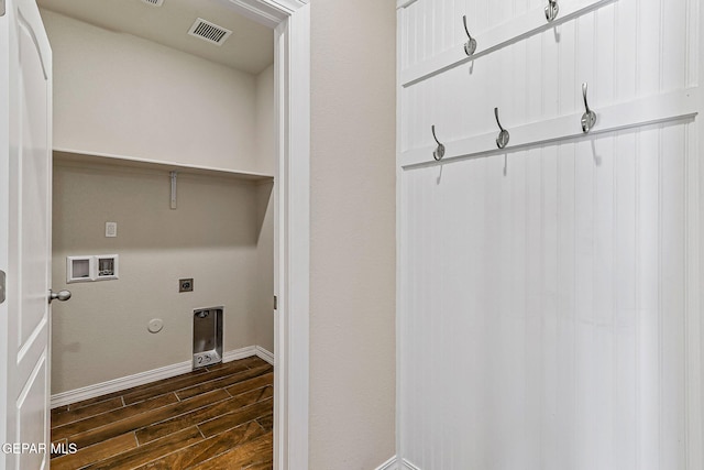 5465 Limestone Dr, El Paso, TX 79934 - washroom with dark wood-style floors, hookup for a gas dryer, hookup for a washing machine, and hookup for an electric dryer