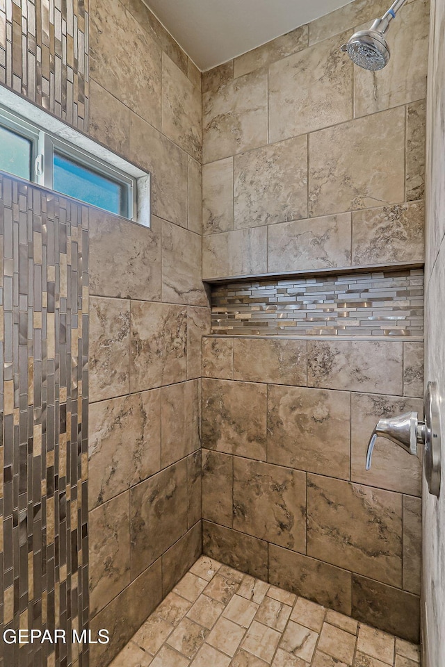 5465 Limestone Dr, El Paso, TX 79934 - bathroom featuring a tile shower