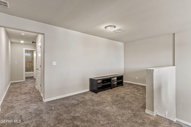5465 Limestone Dr, El Paso, TX 79934 - empty room with carpet flooring and a textured ceiling