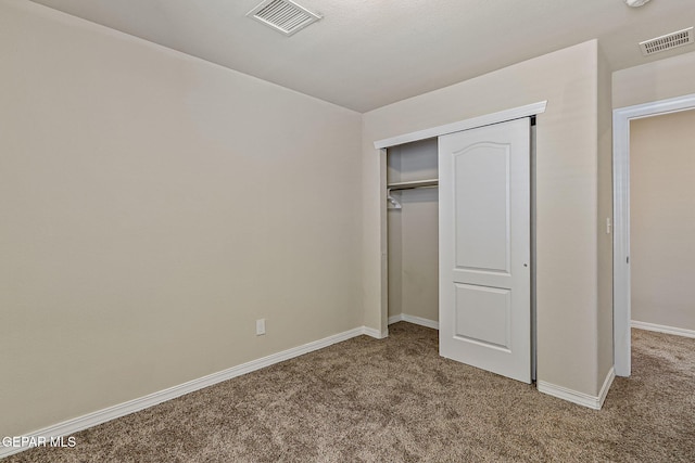 5465 Limestone Dr, El Paso, TX 79934 - unfurnished bedroom featuring carpet and a closet