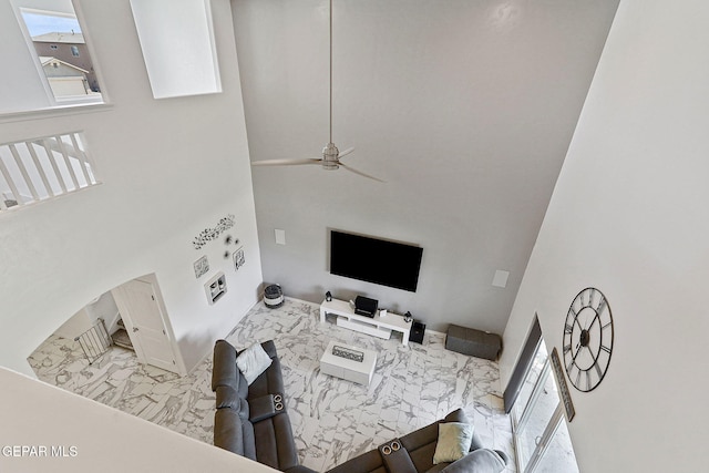 3725 Surmise St, El Paso, TX 79938 - living room featuring a towering ceiling, plenty of natural light, and a ceiling fan
