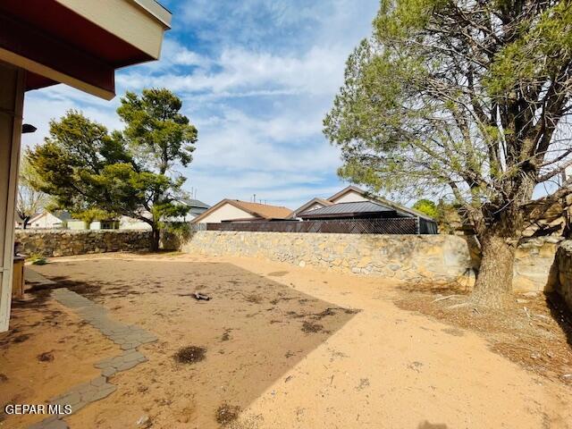 10940 Golden Pond Dr, El Paso, TX 79934 - view of fenced backyard