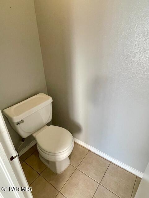10940 Golden Pond Dr, El Paso, TX 79934 - bathroom with tile patterned flooring and baseboards