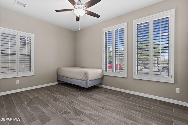 912 Malven Pl, El Paso, TX 79928 - bedroom featuring dark wood-style flooring and ceiling fan